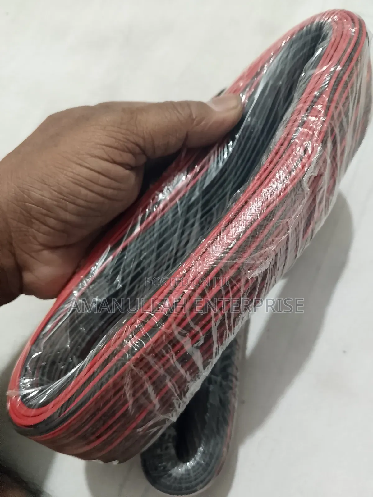Coil of Red and Black PVC Insulated Flexible Electric Cable.