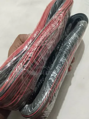 Coil of Red and Black PVC Insulated Flexible Electric Cable.