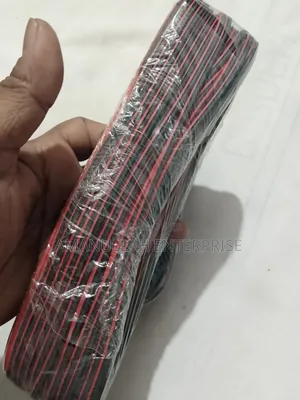 Coil of Red and Black PVC Insulated Flexible Electric Cable.