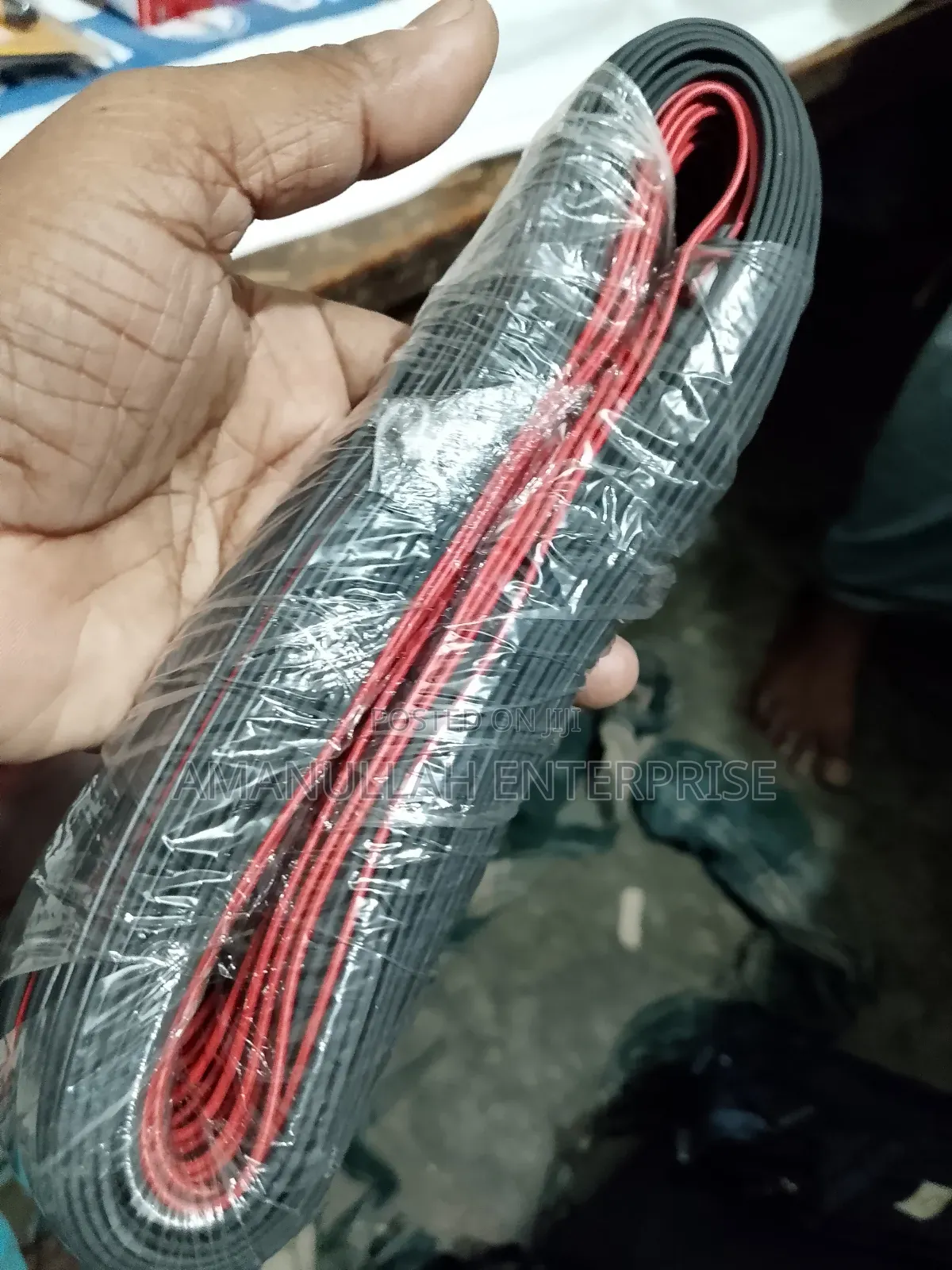 Coil of Red and Black PVC Insulated Flexible Electric Cable.