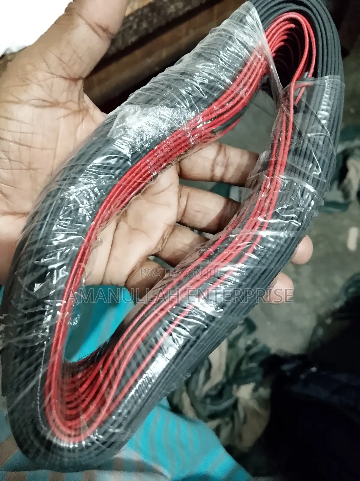 Coil of Red and Black PVC Insulated Flexible Electric Cable.