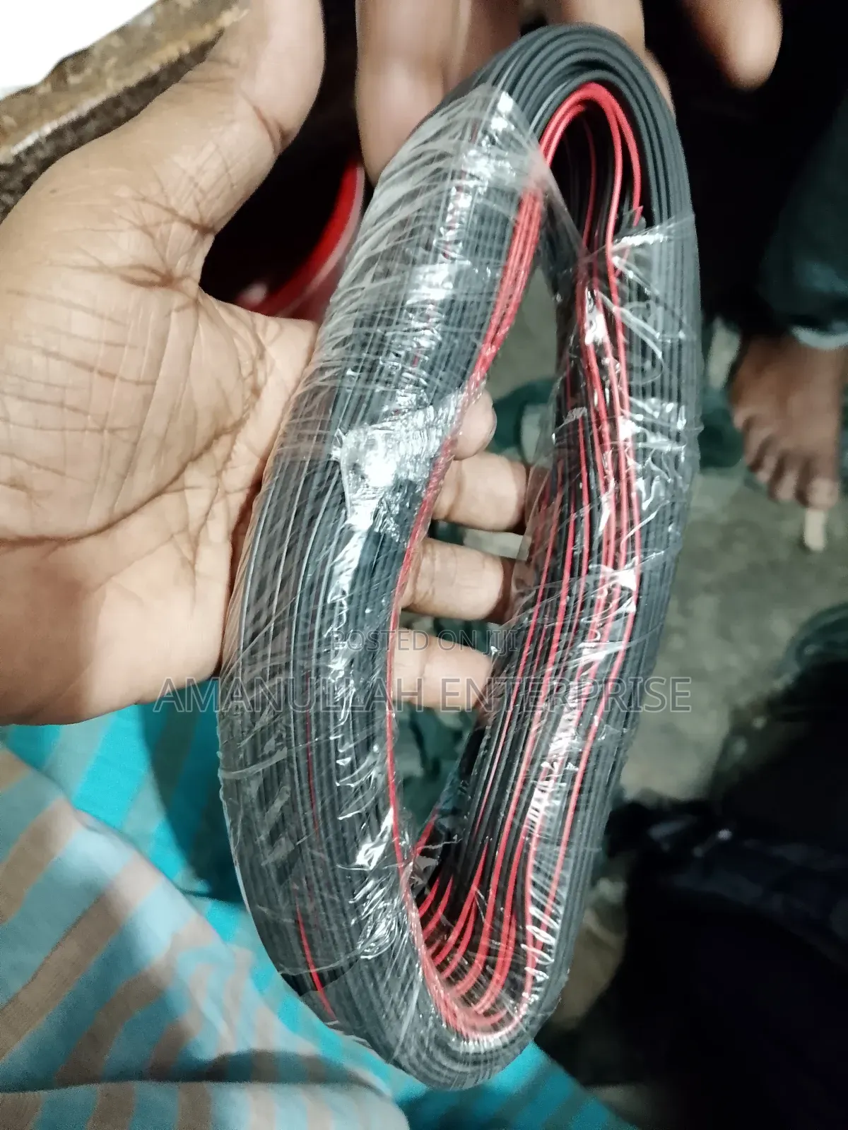 Coil of Red and Black PVC Insulated Flexible Electric Cable.