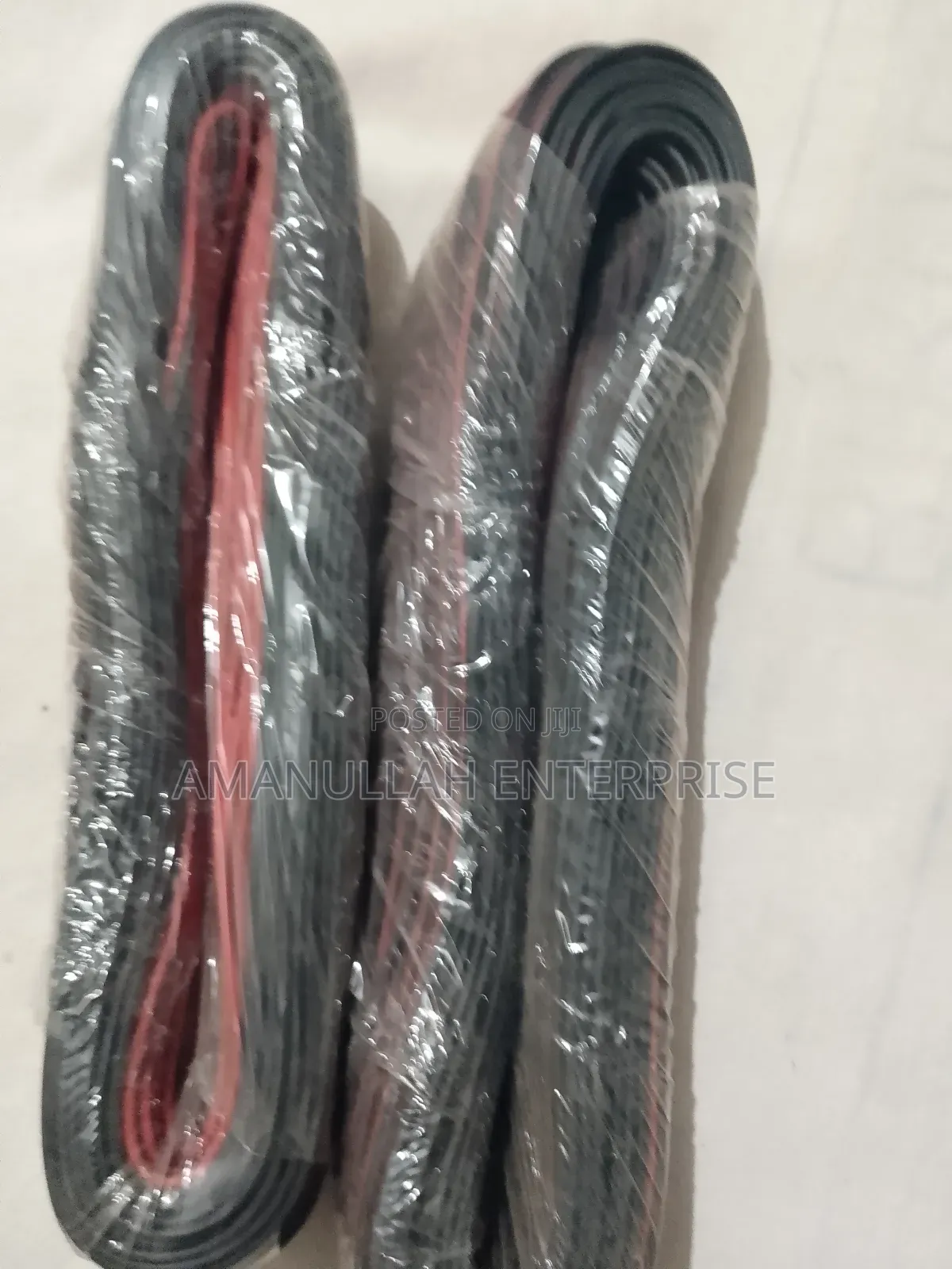 Coil of Red and Black PVC Insulated Flexible Electric Cable.