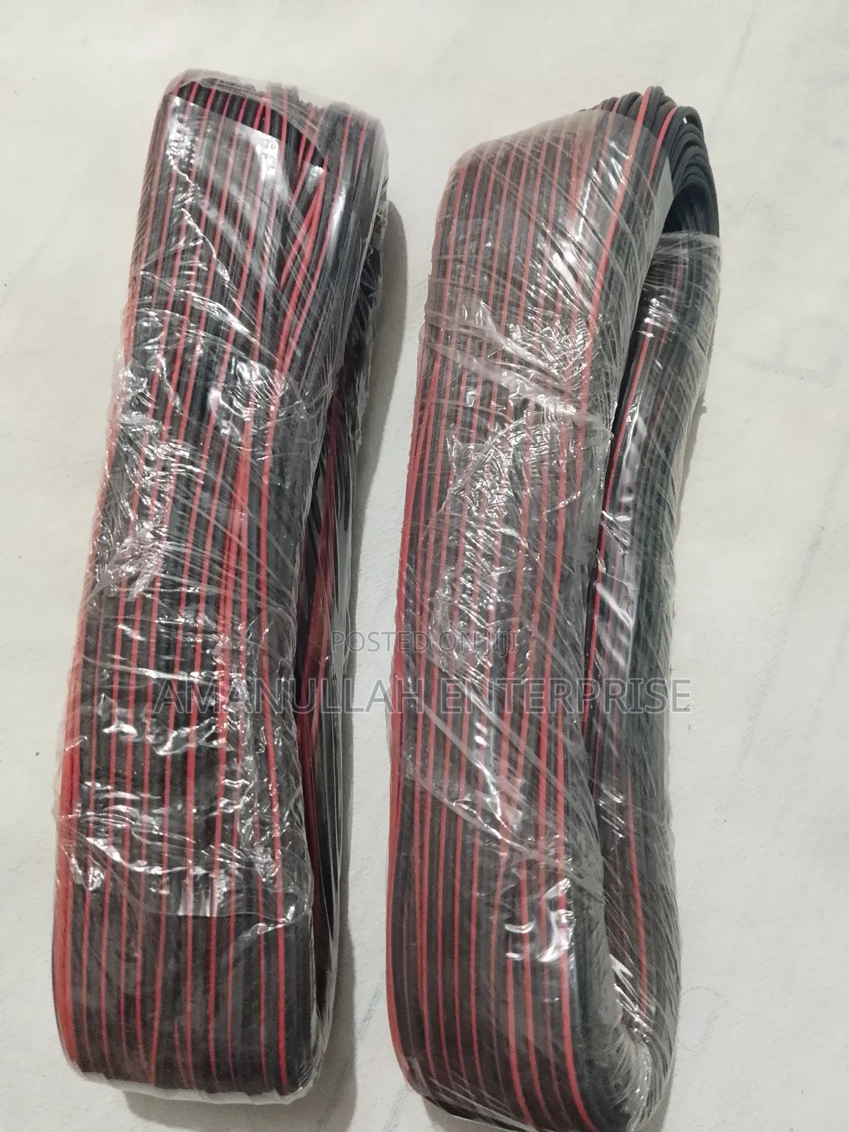 Coil of Red and Black PVC Insulated Flexible Electric Cable.