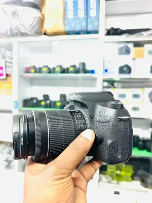 Canon 77d body with 18 55mm stm lens