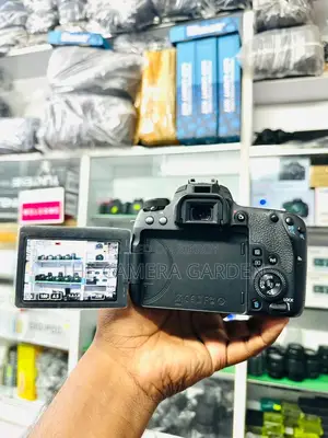 Canon 77d body with 18 55mm stm lens