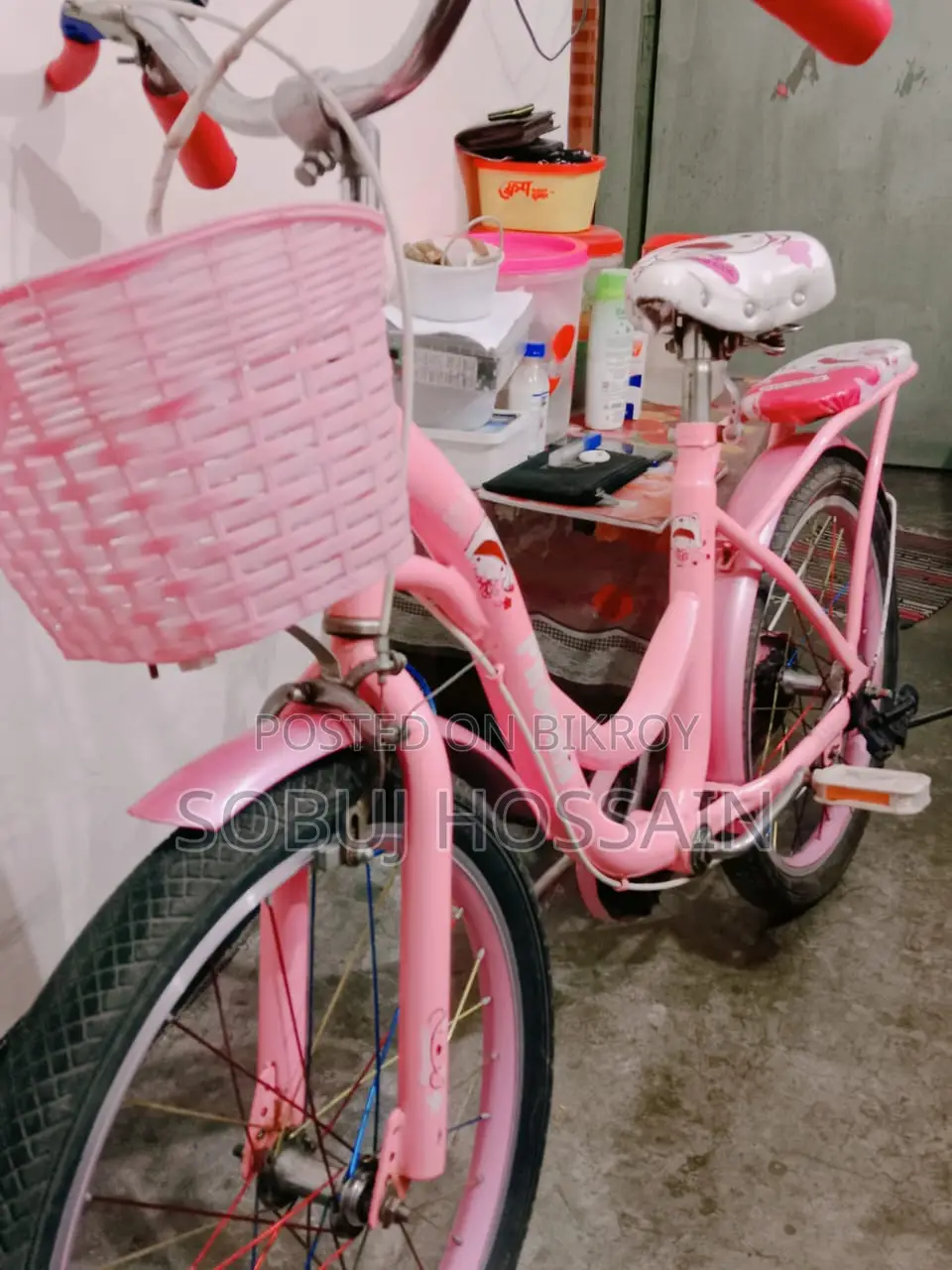 A small ladies' bicycle is for sale.