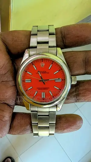 ROLEX Watch with Beautiful Red Dial
