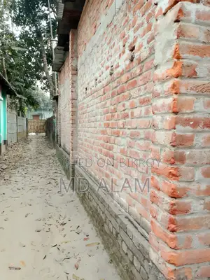 Semi-pucca house with land for sale in Thakurgaon city.