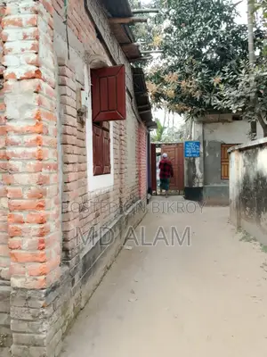 Semi-pucca house with land for sale in Thakurgaon city.