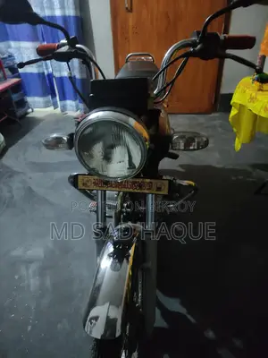 Bajaj Boxer . 2011
