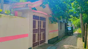 Land with house for sale