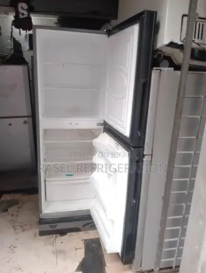 A like-new 341 Liter Walton refrigerator with 6 years official warranty.