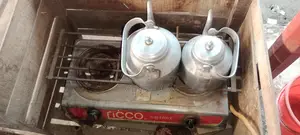 Double burner stove and two large kettles