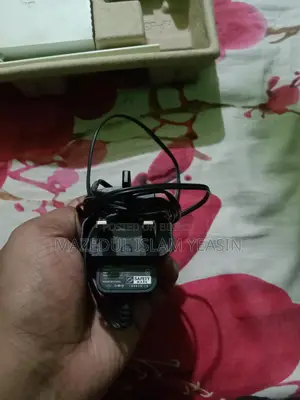 ওয়াইফাই রাউটারের পাওয়ার অ্যাডাপ্টার
