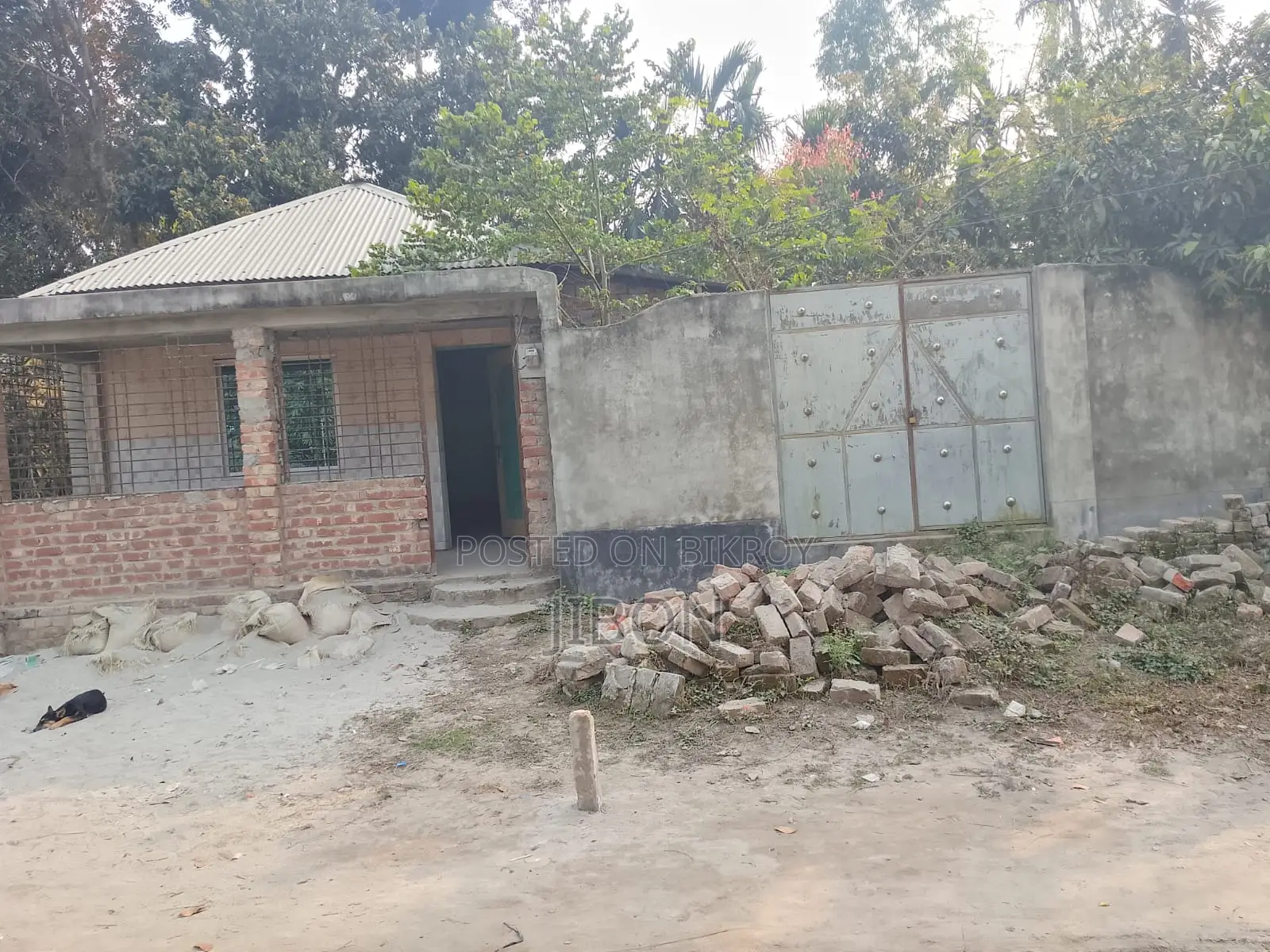 Land with house for sale