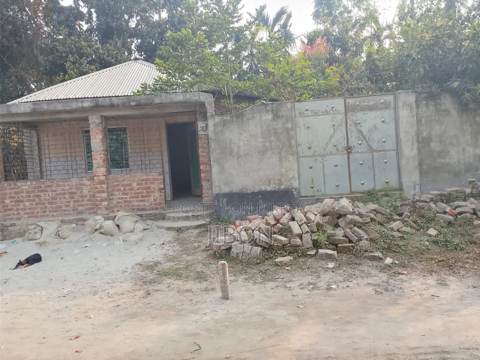 Land with house for sale