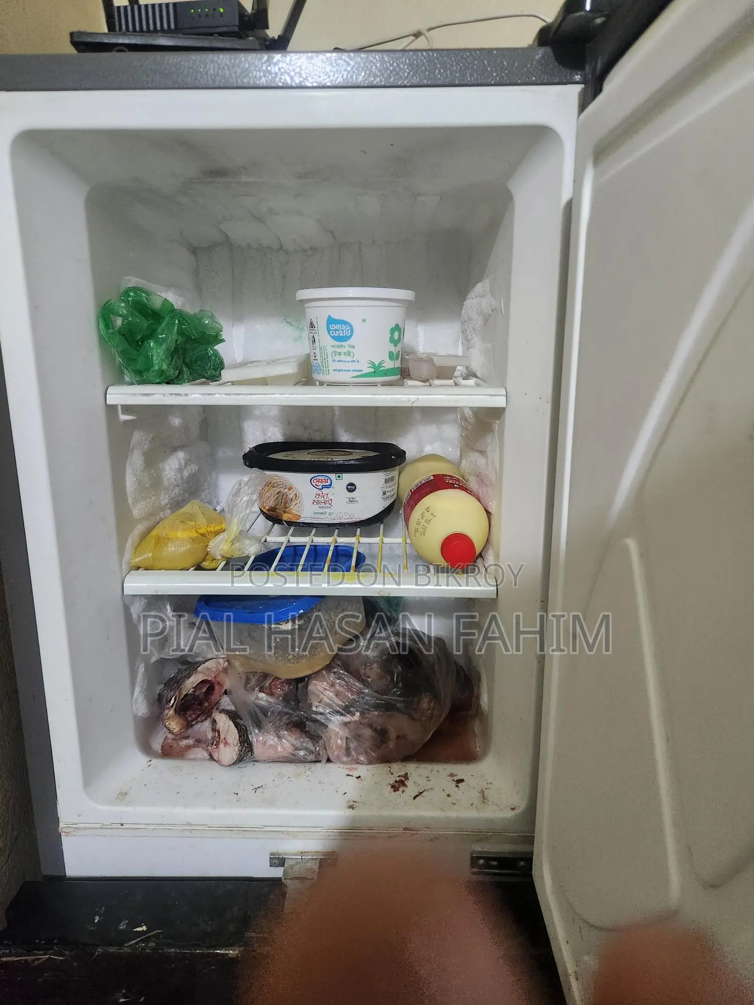 Walton WFD-1F3 Refrigerator. Bought new, 4 years running.