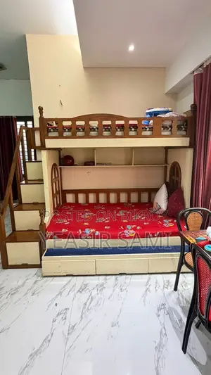 দো তলা খাট বাচ্চাদের জন্য খুবই আকর্ষণীয়।  কাঠের, সাথে ড্রয়ার সিড়ি আছে। সেই সাথে দুইটা ম্যাট্রেক্স নতুন অবস্থায় আছে। শুধু কালার টাচ আপ করতে হবে