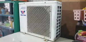 Walton 1 Ton Smart Inverter AC - Original condition with warranty