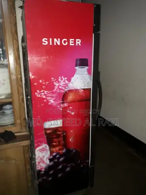 Singer Coke Fridge