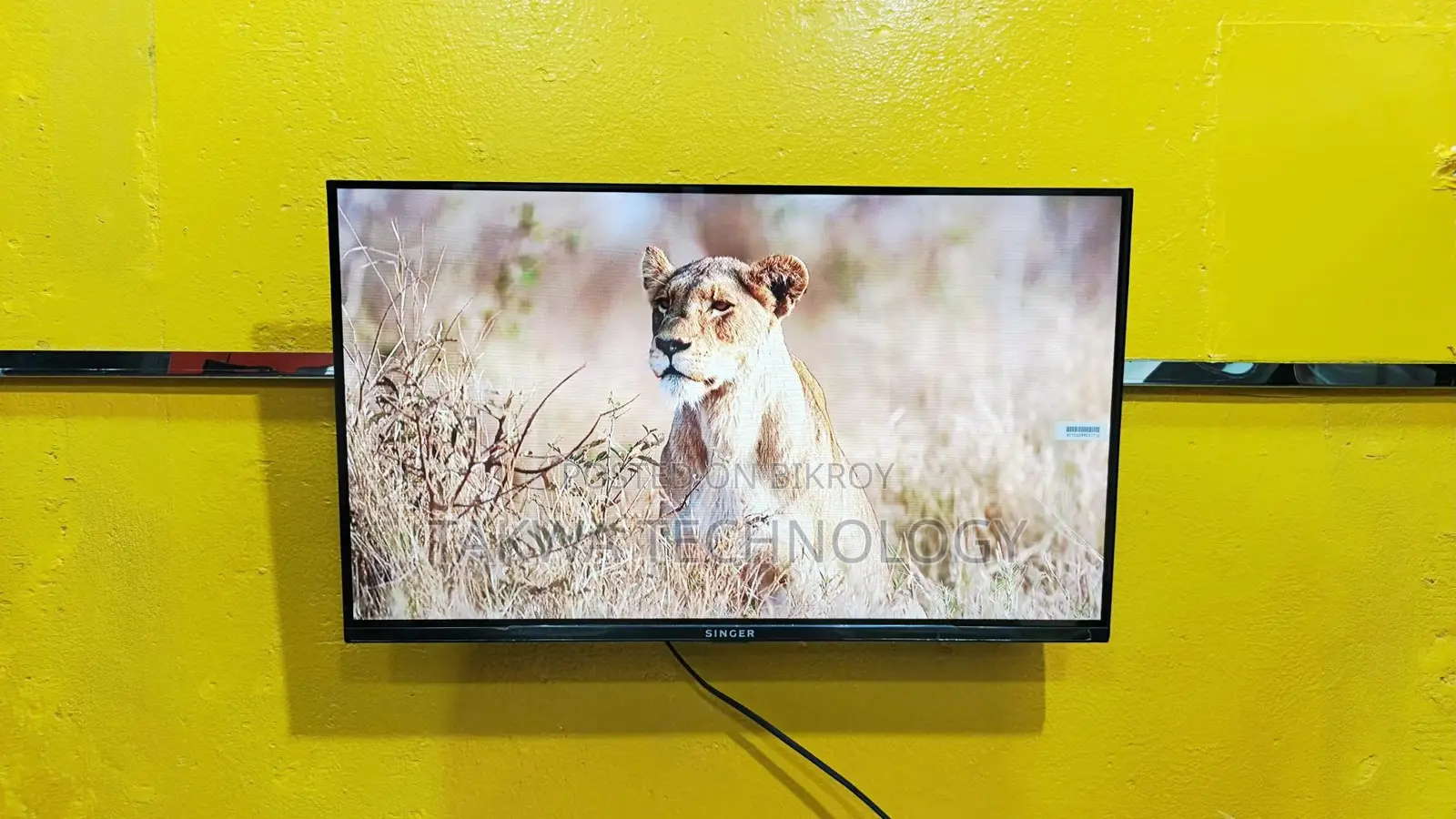 SINGER-32" INCHE ANDROID GOOGLE FRAMLESS VOICE CONTROL TV