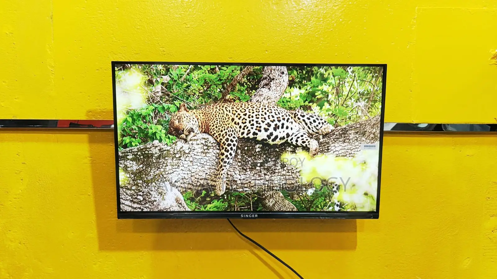 SINGER-32" INCHE ANDROID GOOGLE FRAMLESS VOICE CONTROL TV