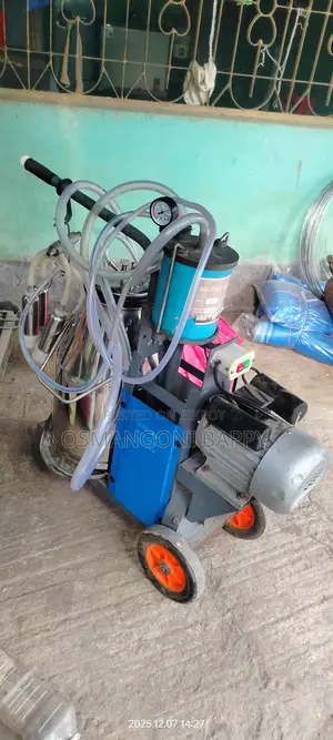অটো দুধ দোয়ানো মেশিন