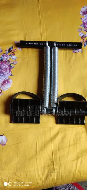 Double-spring tummy trimmer