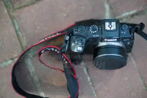Canon EOS RP Body + 2 Battery Adapter — Box Sale