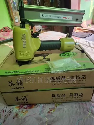 Neum Atic Nailer (এয়ার চালিত পেরেক মারার মেশিন)—ব্র্যান্ড: Meite।