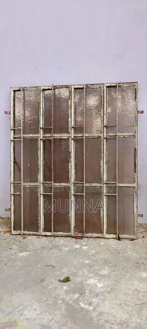 পুরাতন দুইটি লোহার জানালা ।