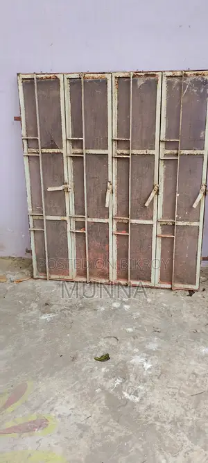 পুরাতন দুইটি লোহার জানালা ।