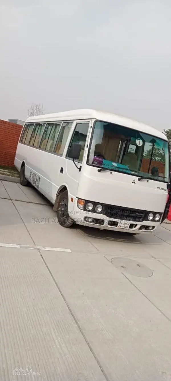 Ac Mini Coaster Bus For Rent (29 Seats)