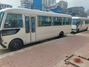 Nissan AC Coaster Bus For Rent