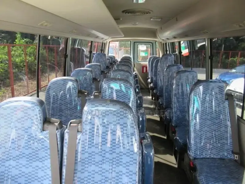 Nissan AC Coaster Bus For Rent