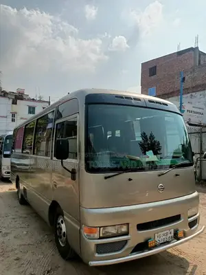 Rent a Nissan Coaster AC Bus