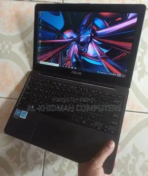 Asus 8th Gen Ultra Slim Mini Laptop, available for courier delivery nationwide.