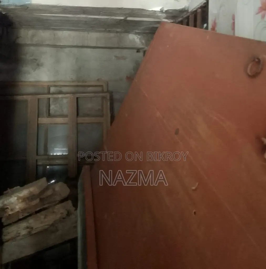 Wooden Door and Two Window Grills for Sale at an Attractive Price