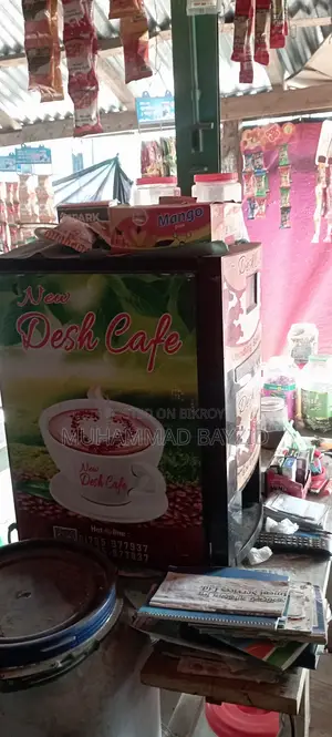 Coffee machine for sale due to urgent need for money. Makes tea, milk, and hot water.