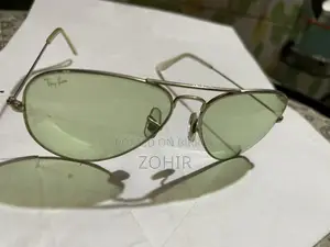 Vintage Ray Ban BL Photochromic Sunglasses 58 14 green lenses.