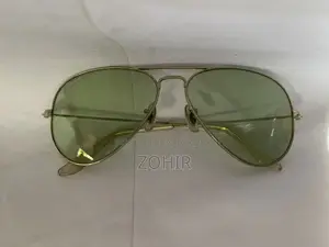 Vintage Ray Ban BL Photochromic Sunglasses 58 14 green lenses.