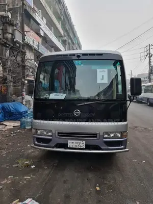 Nissan Coster Bus For Rent