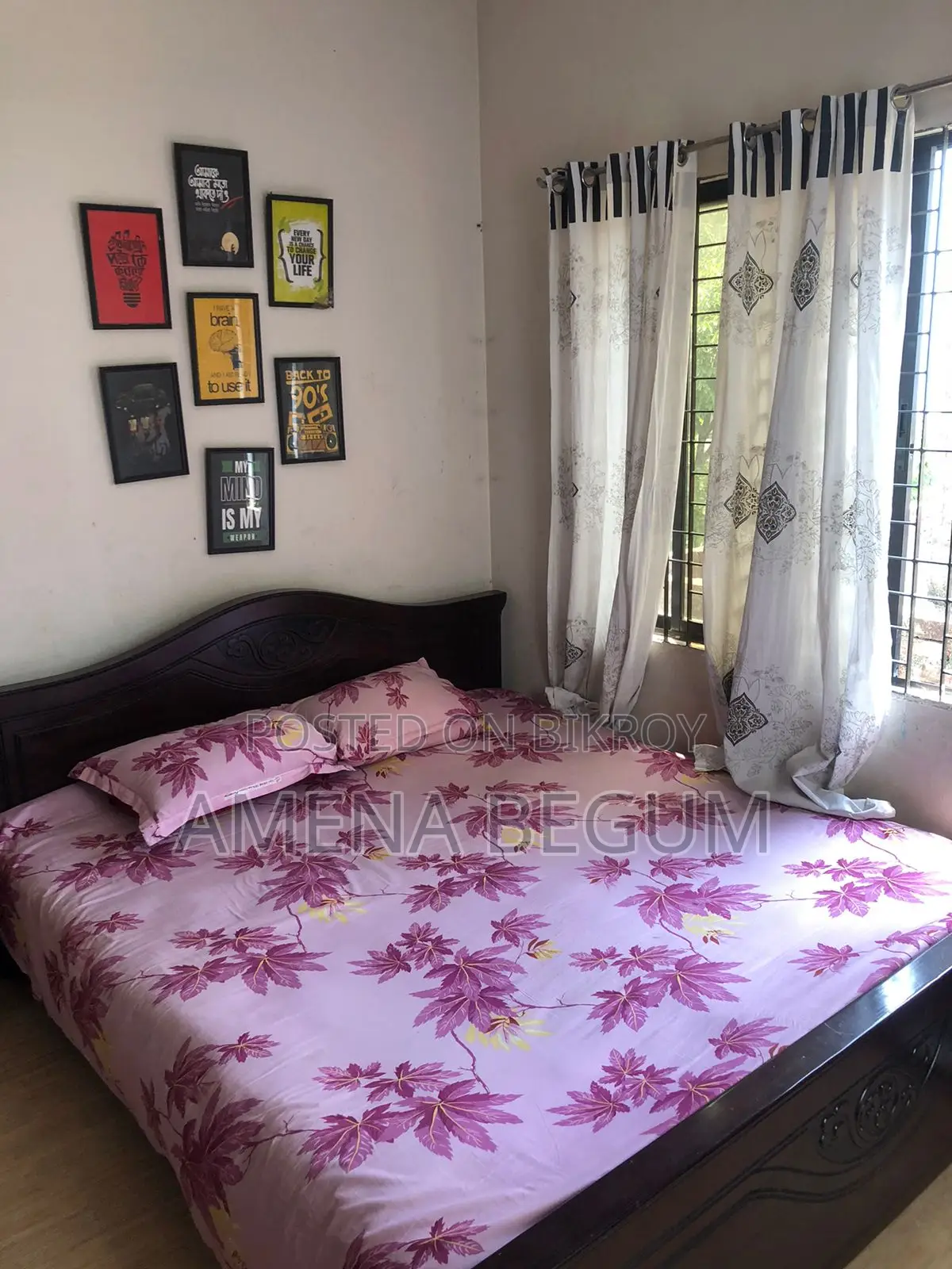 Malaysian wood bed for sale at a very low price.