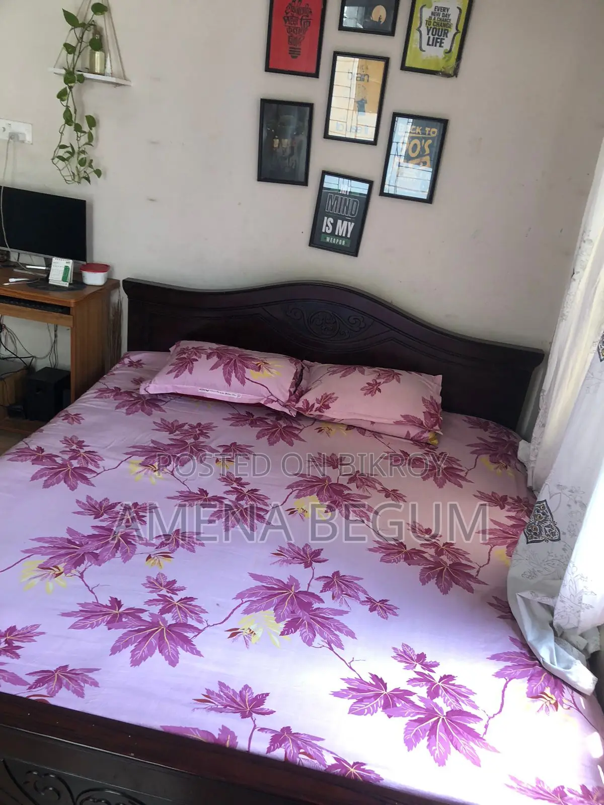 Malaysian wood bed for sale at a very low price.
