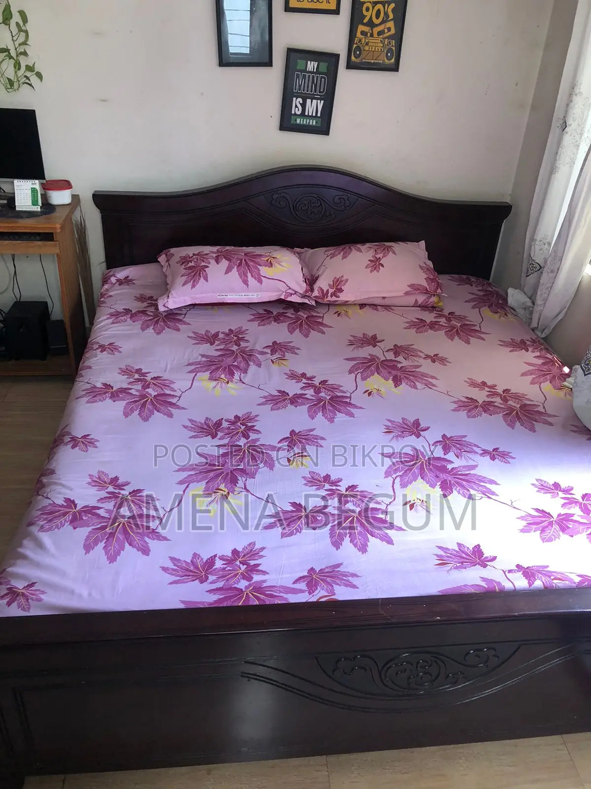 Malaysian wood bed for sale at a very low price.