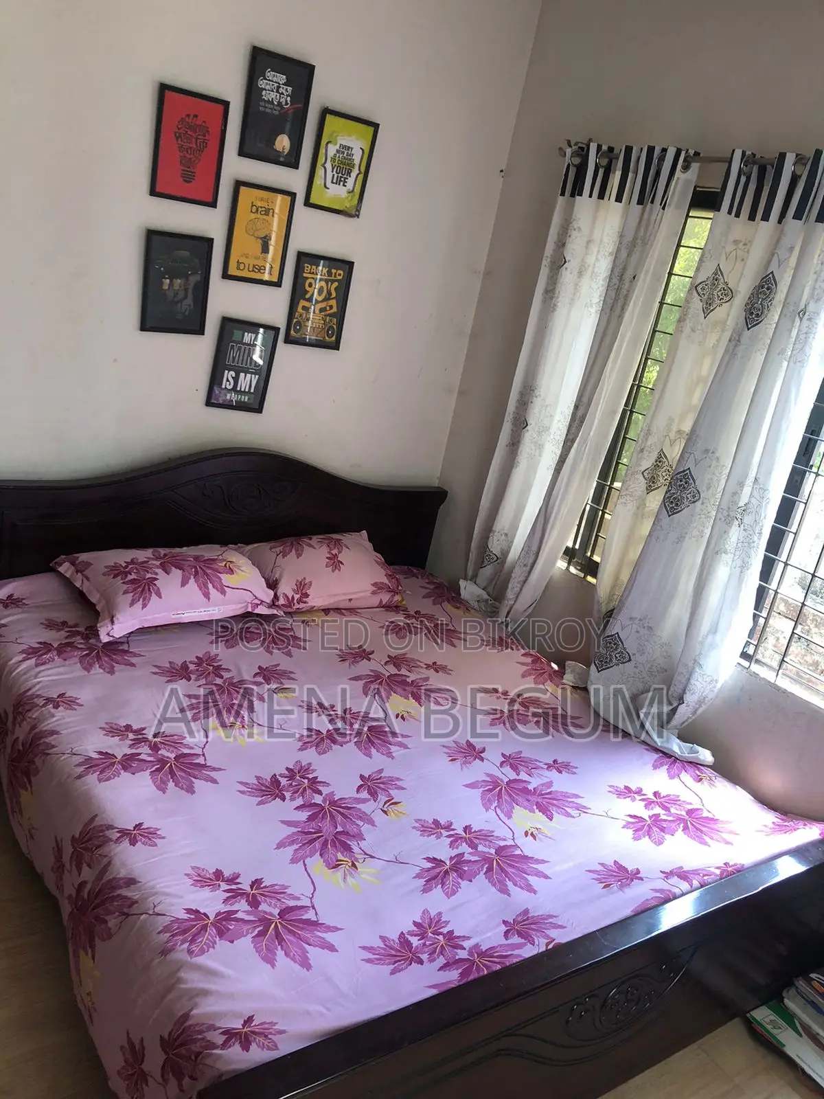 Malaysian wood bed for sale at a very low price.