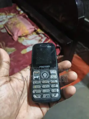Proton Button phone (Used)