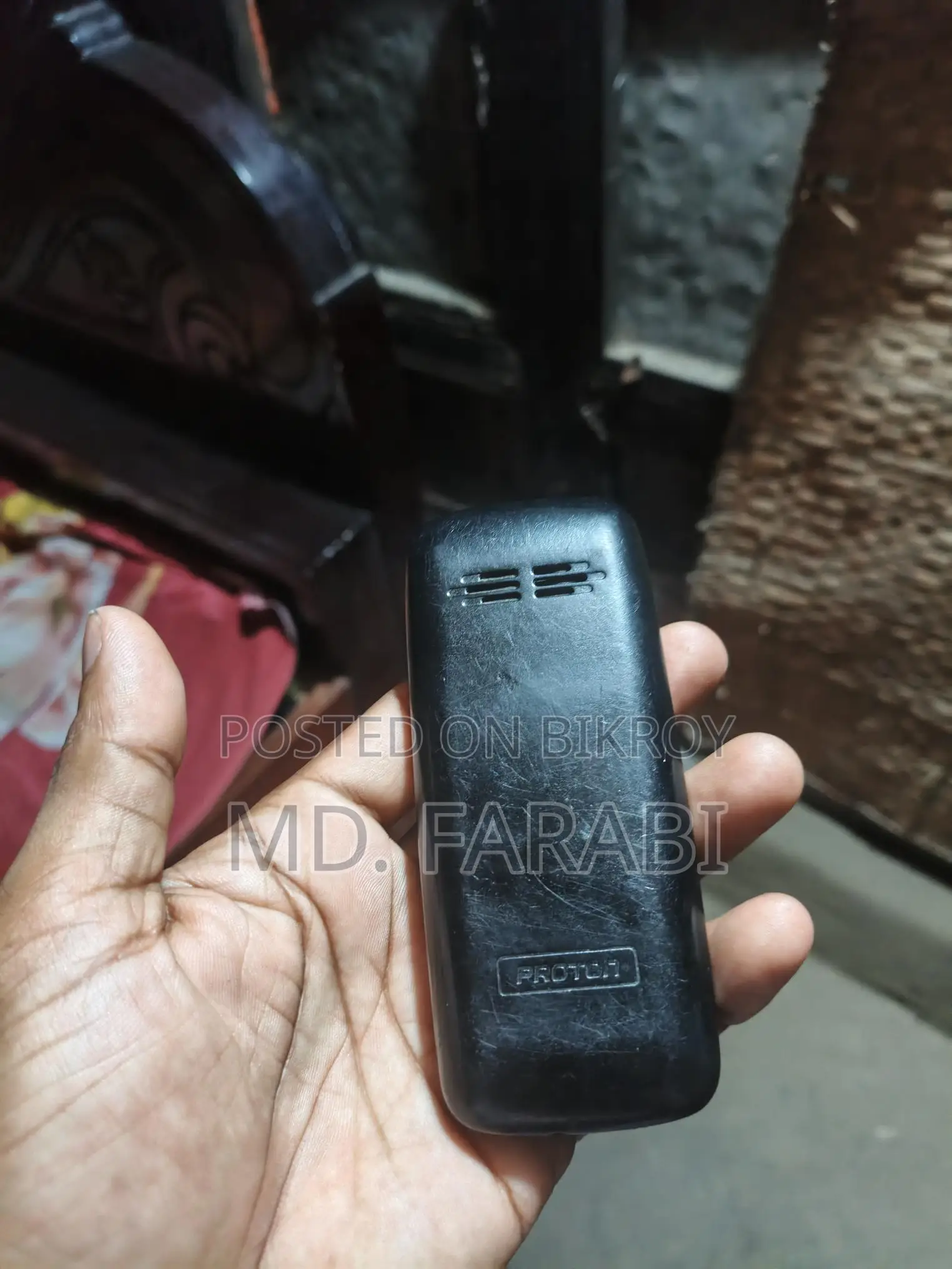 Proton Button phone (Used)