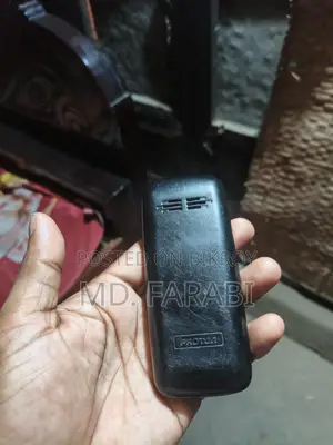 Proton Button phone (Used)